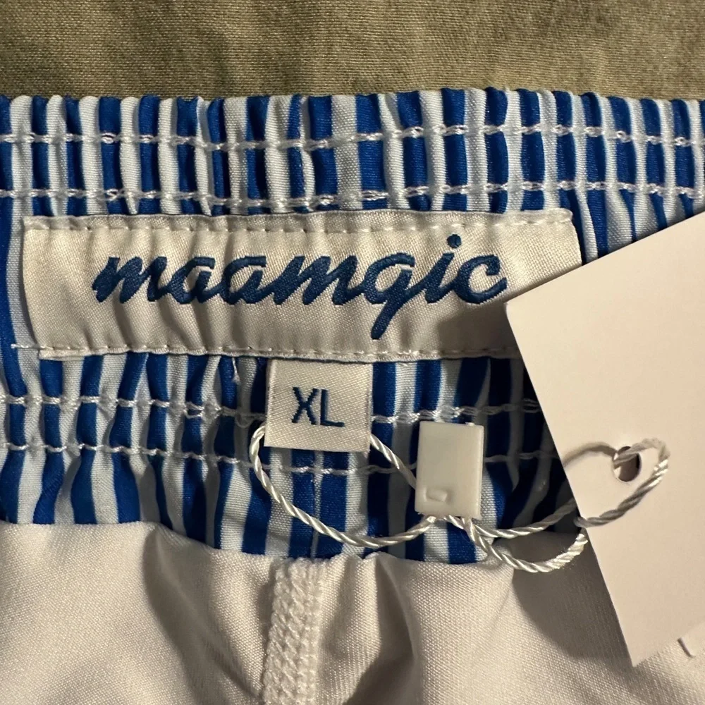 NWT/NIP - Men’s maamgic swim shorts.